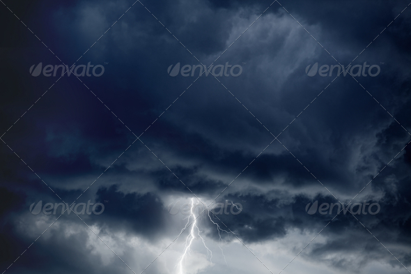 Nature force background – bright lightning in dark stormy sky