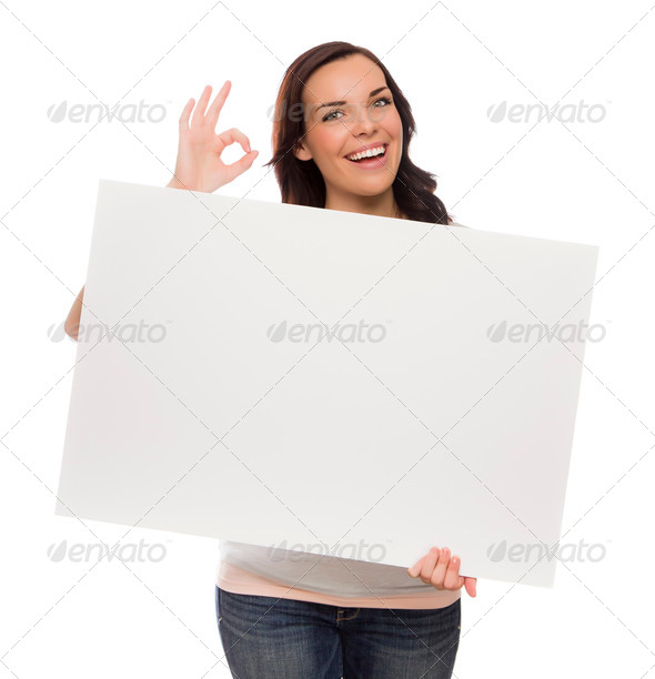 Beautiful Mixed Race Female Holding Blank Sign Isolated on a White Background Giving OK Gesture. (Misc) Photo Download