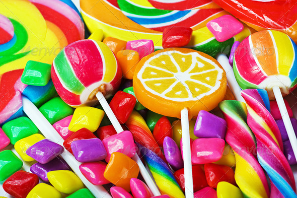 multicolored lollipops, candy and chewing gum - Stock Photo - Images