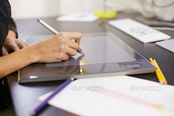 Stock Photo - PhotoDune Woman drawing sketches on computer in fashion design studio 622738 Stock Photo - PhotoDune Woman drawing sketches on computer in fashion design studio 622738
