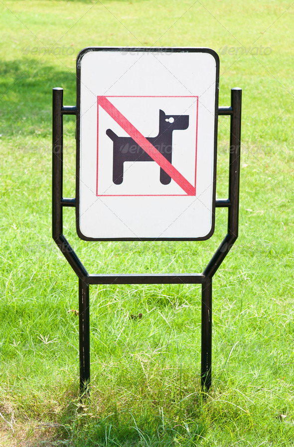 No dogs pets allowed warning sign