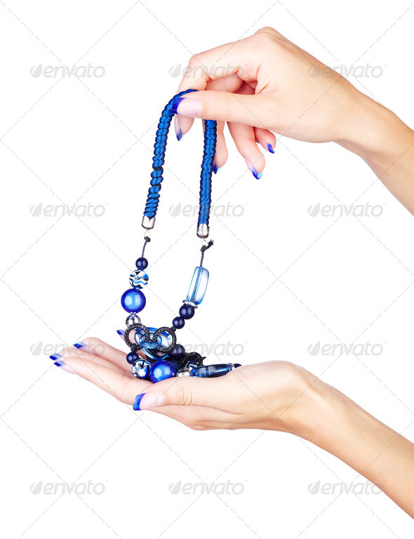 hands with beads - Stock Photo - Images