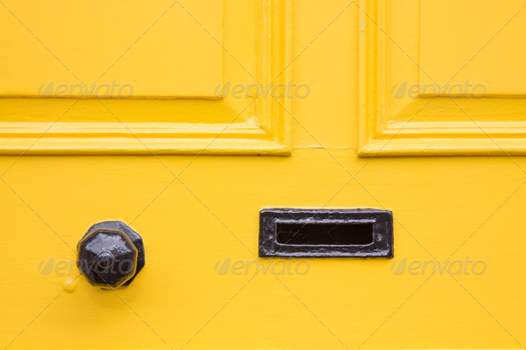 Detail of a yellow front door