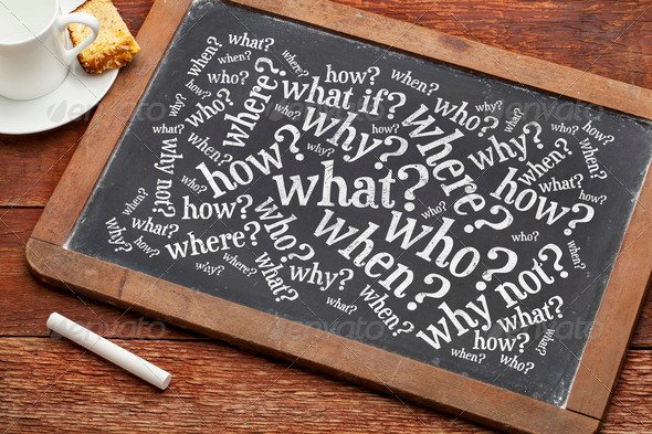 who, what, when, where, why, how questions – brainstorming concept on a vintage slate blackboard with a cup of coffee