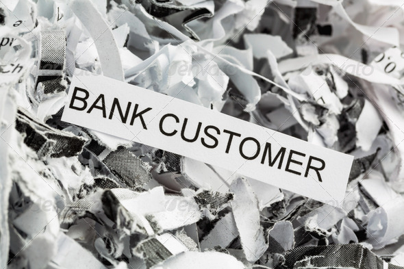 shredded paper tagged with bank customer, symbol photo for data destruction, customer data and banking secrecy