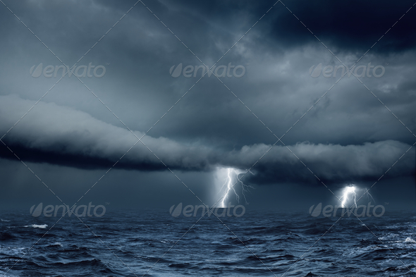 Nature force background – bright lightnings, dark stormy sky and sea, ocean