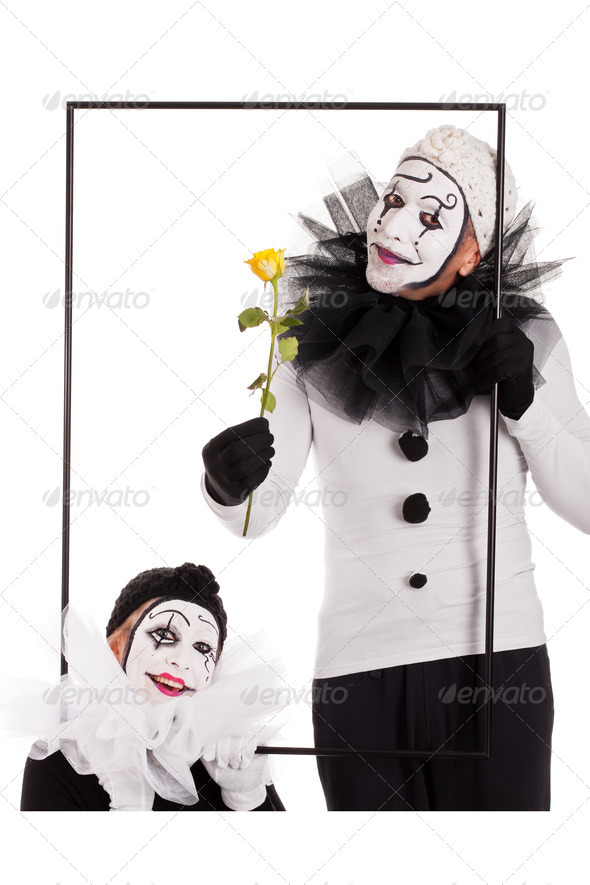 two clowns in a frame with a yellow flower (Misc) Photo Download