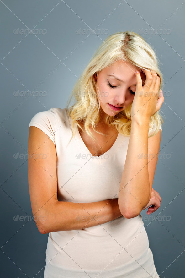 Stressed young woman - Stock Photo - Images
