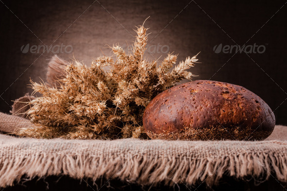 Loaf of bread and rye ears still life (Misc) Photo Download