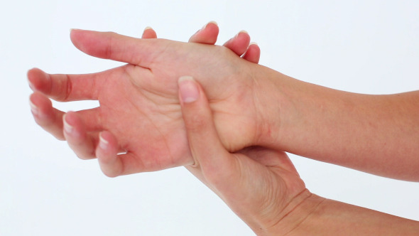 Woman Holding Her Sore Hand Woman Holding Her Sore Hand