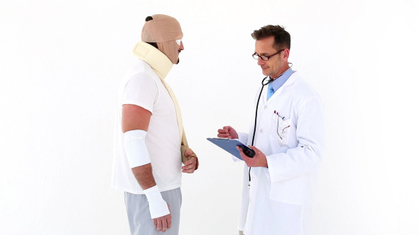 Doctor Talking To Very Injured Patient Doctor Talking To Very Injured Patient