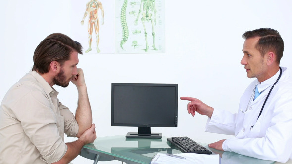 Patient Talking With His Doctor About Injury Patient Talking With His Doctor About Injury