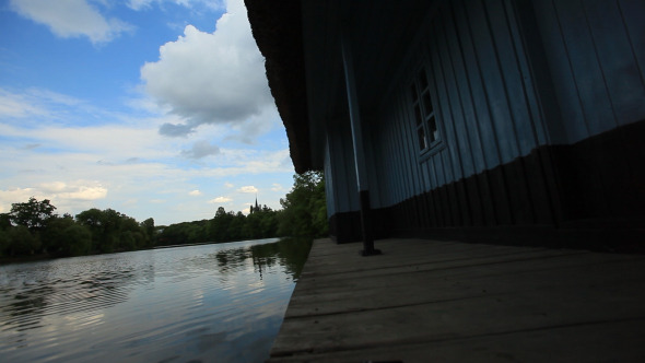 Lake Water Near Rustic Traditional House Lake Water Near Rustic Traditional House