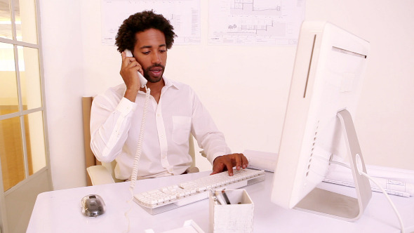 Businessman Working At His Desk 2 Businessman Working At His Desk 2
