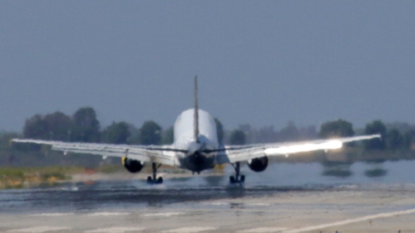 Commercial Jet Plane Landing in Barcelona Airport Commercial Jet Plane Landing in Barcelona Airport