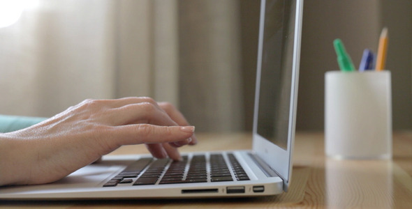 Typing Girl On The Laptop Typing Girl On The Laptop