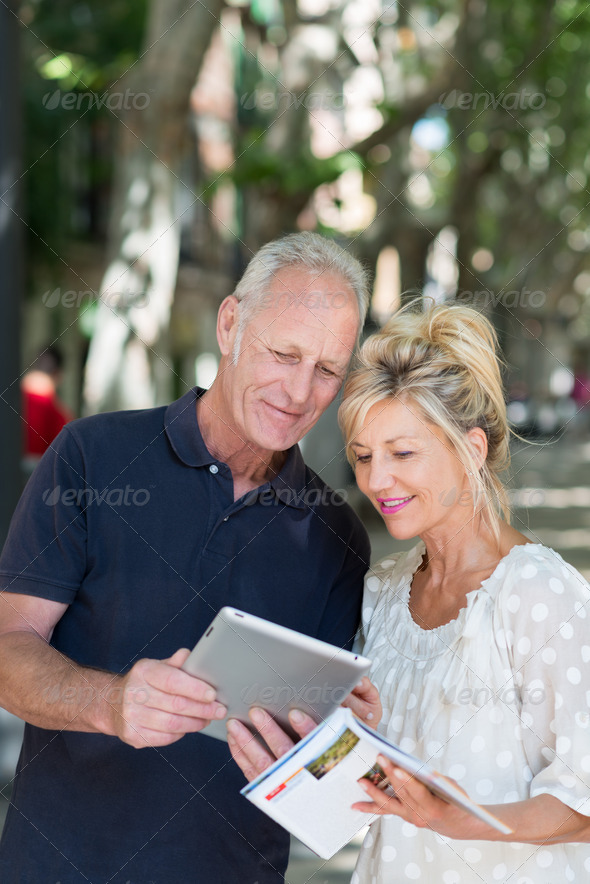 Couple checking information on a tablet-pc