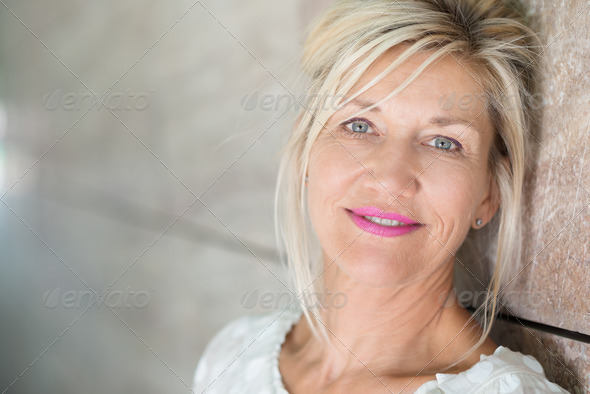 Attractive middle-aged woman with blond hair