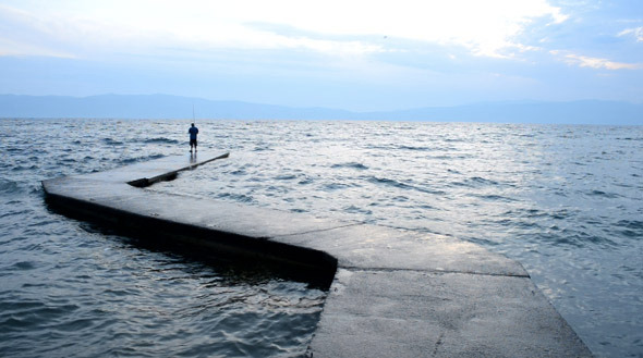 Fisherman on a Dock Fisherman on a Dock