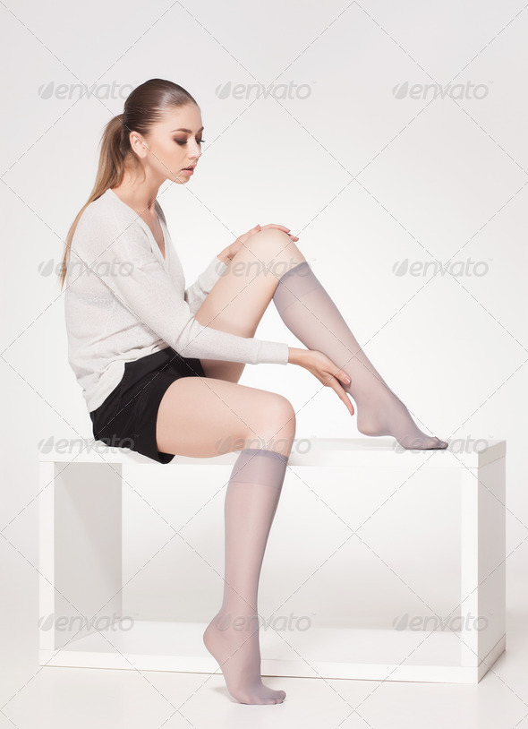beautiful woman wearing knee lycra socks - full body