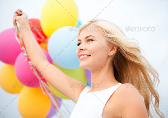 woman with colorful balloons outside (Misc) Photo Download