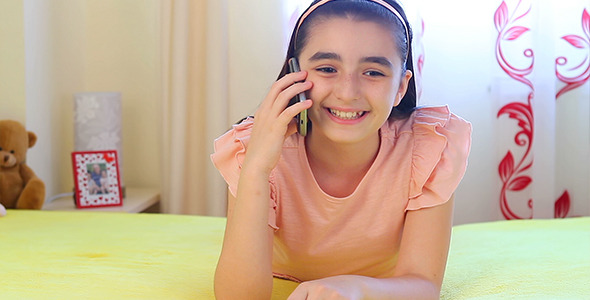 Teenager Girl Talking on the Smartphone Teenager Girl Talking on the Smartphone