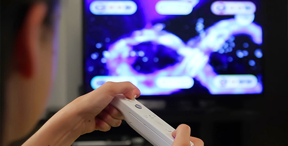 Teenage Girl Playing Video Games on Smart TV Teenage Girl Playing Video Games on Smart TV