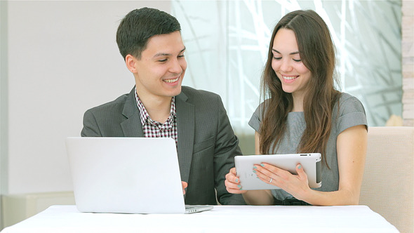 Young Businesspeople to Each Other Young Businesspeople to Each Other