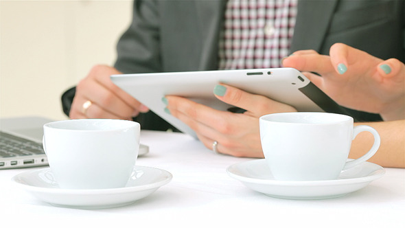 Confident Young People Work for the Tablet Confident Young People Work for the Tablet