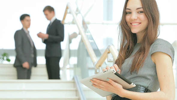 Beautiful Business Woman Smiling at the Camera Beautiful Business Woman Smiling at the Camera