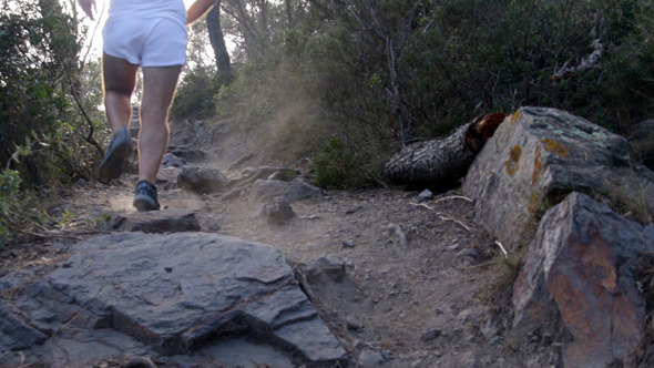 Runner Climbing the Rocks Runner Climbing the Rocks
