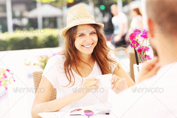 Happy woman in a cafe