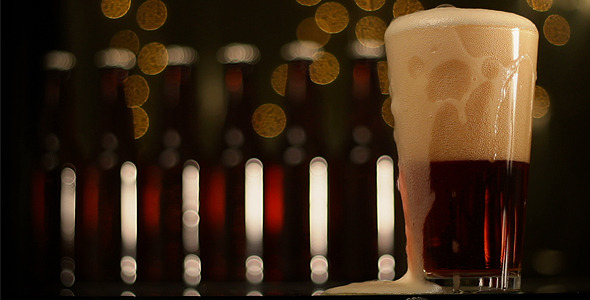 Pouring dark beer Pouring dark beer