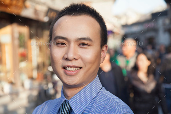 Portrait of young business man in Houhai, Beijing, China