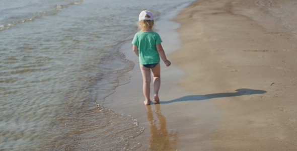 Kid Walking by the Sea Kid Walking by the Sea
