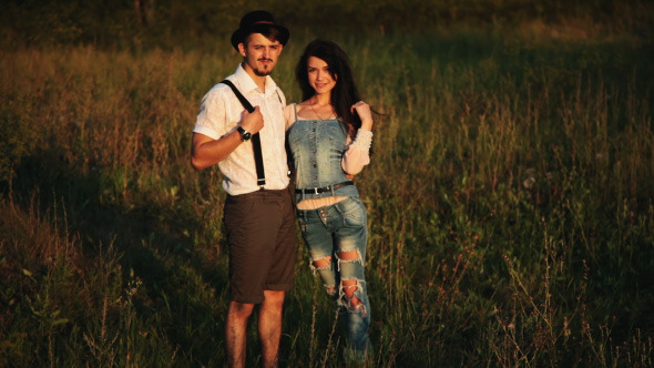Loving couple posing At Aunset Country And Nature Loving couple posing At Aunset Country And Nature
