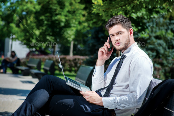 Communication with clients. Confident and successful businessman