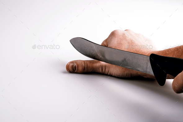 Close up of a suicidal man hand on isolated white background (Misc) Photo Download