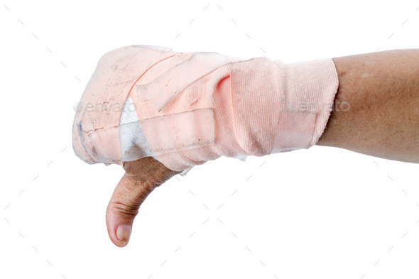 Thumb down showing by hand with bandages isolated on white (Misc) Photo Download