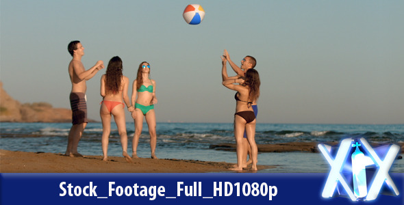 Young People Playing Ball On The Beach Young People Playing Ball On The Beach