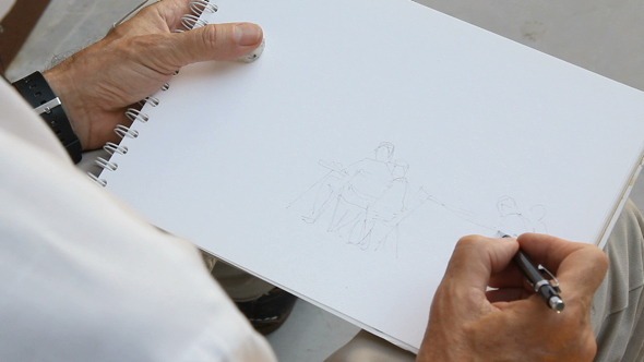 Sketcher Drawing in a Book Sketcher Drawing in a Book