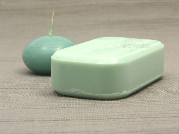 Green soap and green candle on a gray background (Misc) Photo Download