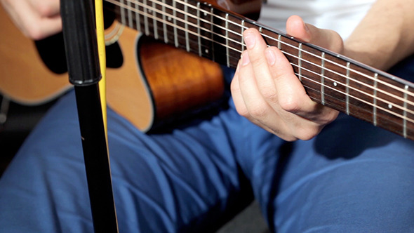 Playing At Classic Acoustic Guitar Playing At Classic Acoustic Guitar