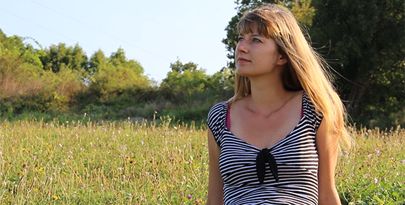 Beautiful Girl Sitting on the Grass 2 Beautiful Girl Sitting on the Grass 2