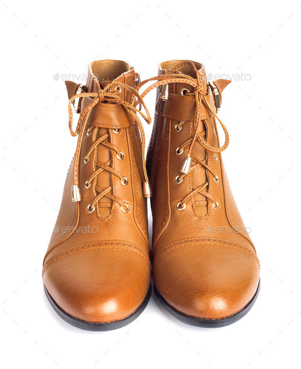 Pair of brown female boots isolated on white background (Misc) Photo Download