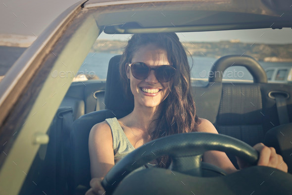 Girl driving a car (Misc) Photo Download