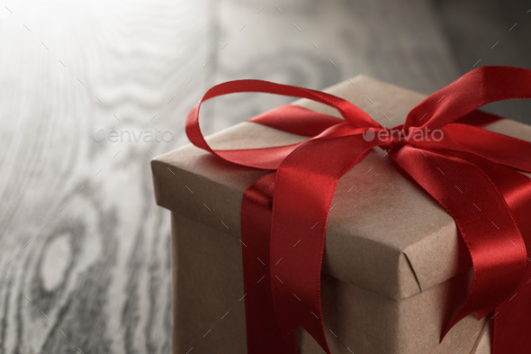 rustic gift box with red ribbon bow (Misc) Photo Download