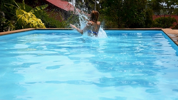 Girl Jumping in Pool Girl Jumping in Pool