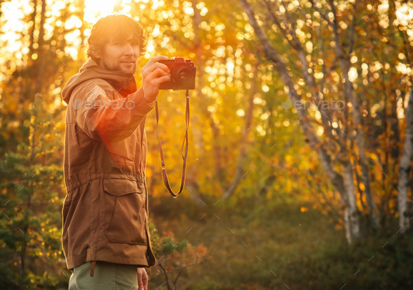 Young Man with retro photo camera outdoor Lifestyle sunlight (Misc) Photo Download