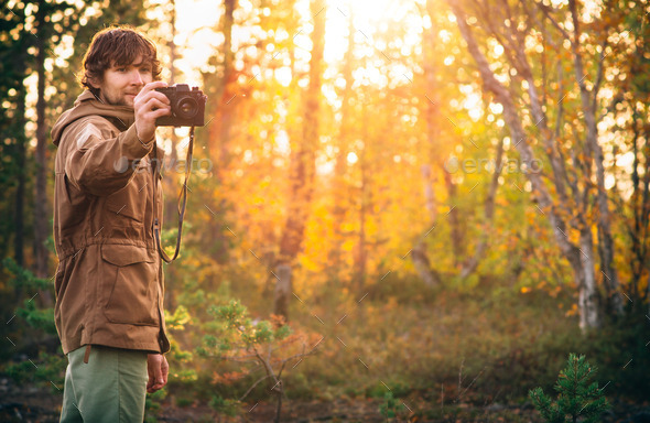 Young Man with retro photo camera outdoor Lifestyle (Misc) Photo Download